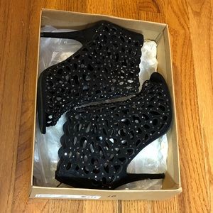 Black studded enclosed peep toe heels